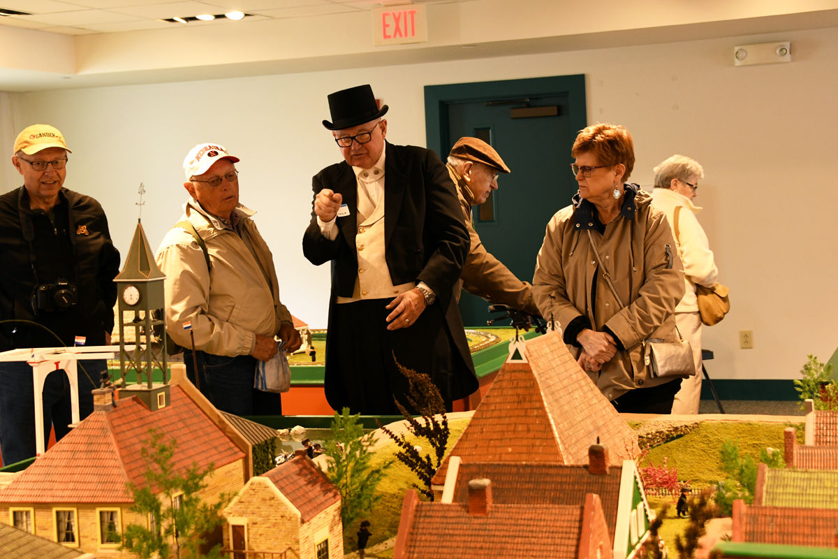 179 Don and Donna Regier chat with a Pella museum volunteer.JPG